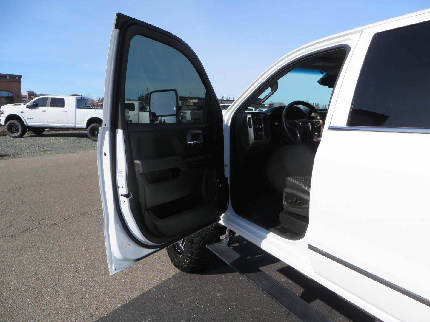 2015 White GMC Sierra 2500 HD Crew Cab Denali (1GT120E88FF) with an V8 Turbo Dsl 6.6L engine, Auto 6-Spd Allison OD transmission, located at 2630 Grass Valley Highway, Auburn, CA, 95603, (530) 508-5100, 38.937893, -121.095482 - 2015 GMC Denali 2500 6.6L Duramax Diesel. Cognito 4-6" lift kit, Cognito traction bars, Cognito idler and pitman support, Kryptonite upper control arms, Fox remote reservoir shocks, Amp power steps, Fuel Offroad wheels, Nitto Ridge Grappler tires, Alpine Stereo Firestone ride rite air bags, Transfer - Photo#15